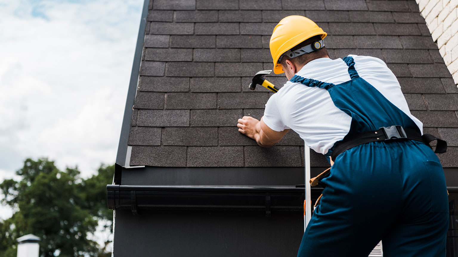 Man working on roof